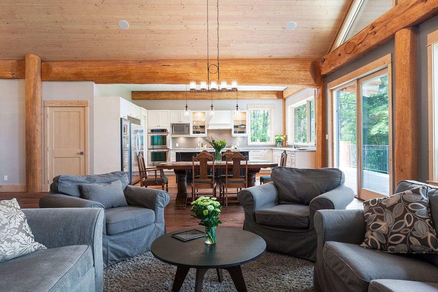 Post and Beam Home Living area and kitchen, BC Log Home Builder.