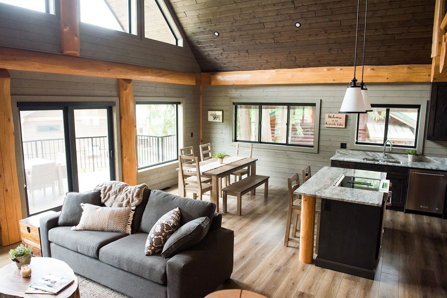 Interior living area of log cabin kit, BC Log Home Builder.