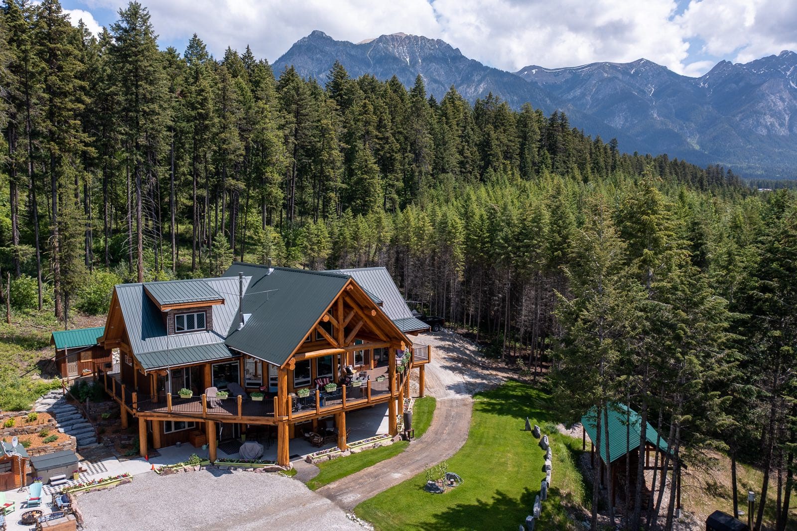 aerial view of post and beam custom built log home.