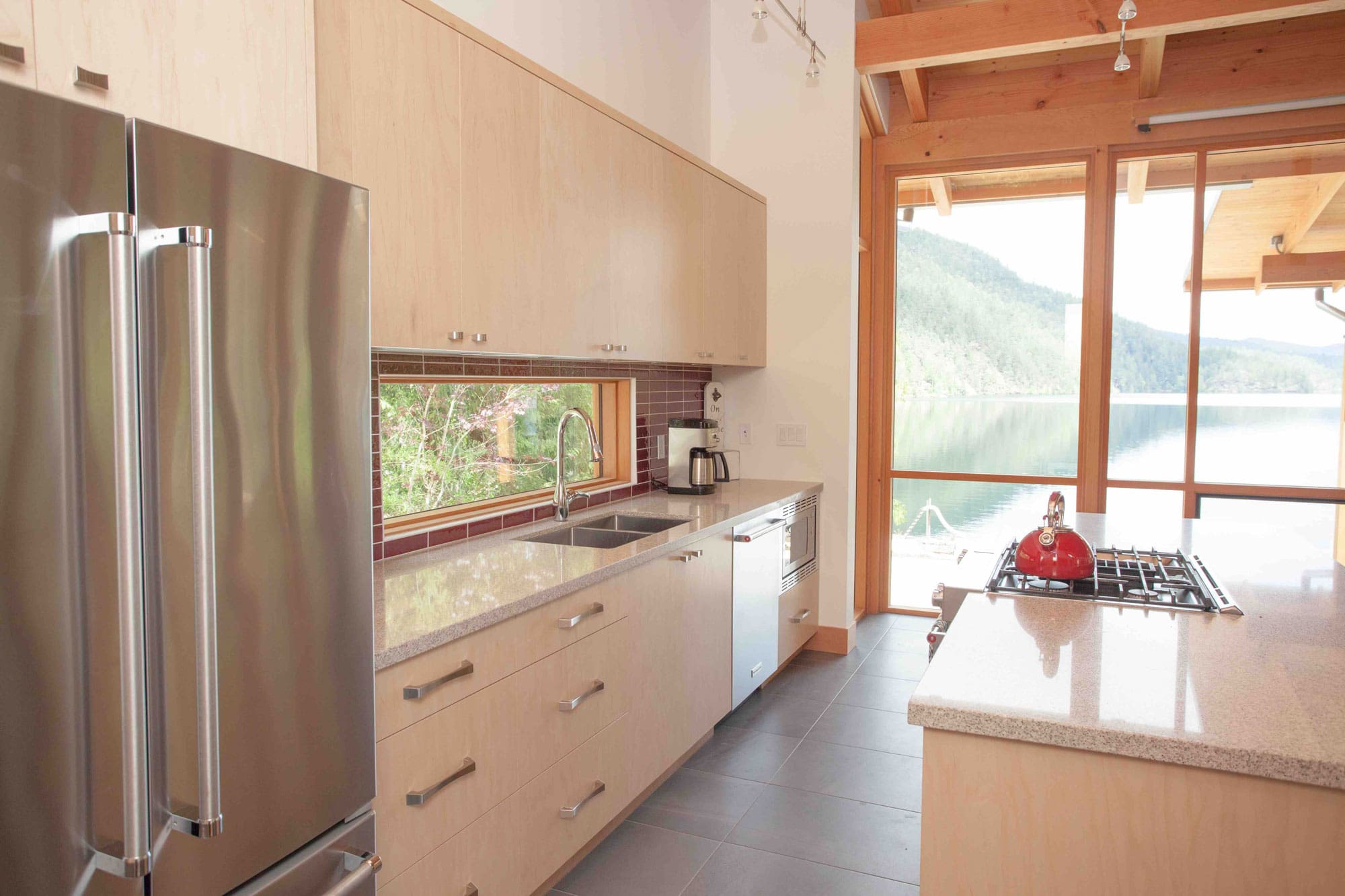 Kitchen in Modern Timber Frame Log Home.