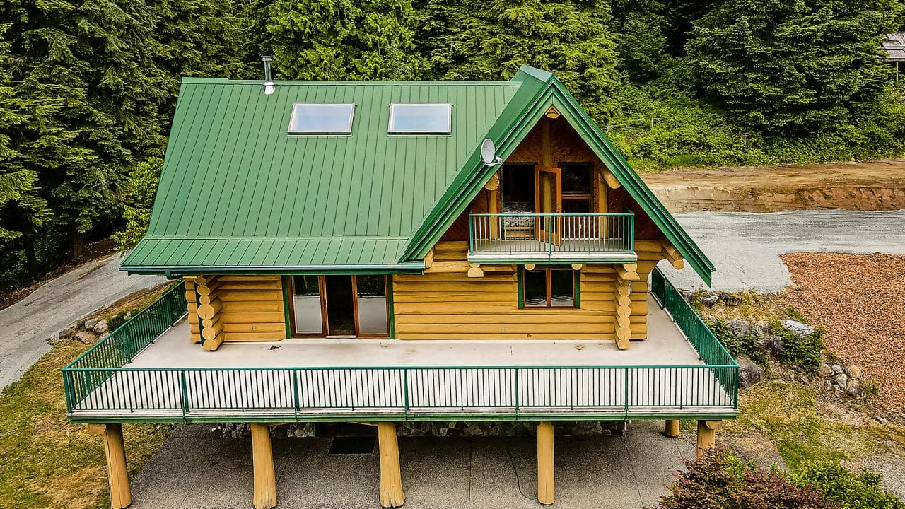 Exterior of BC Home Builders Custom Full Scribe Log Home.