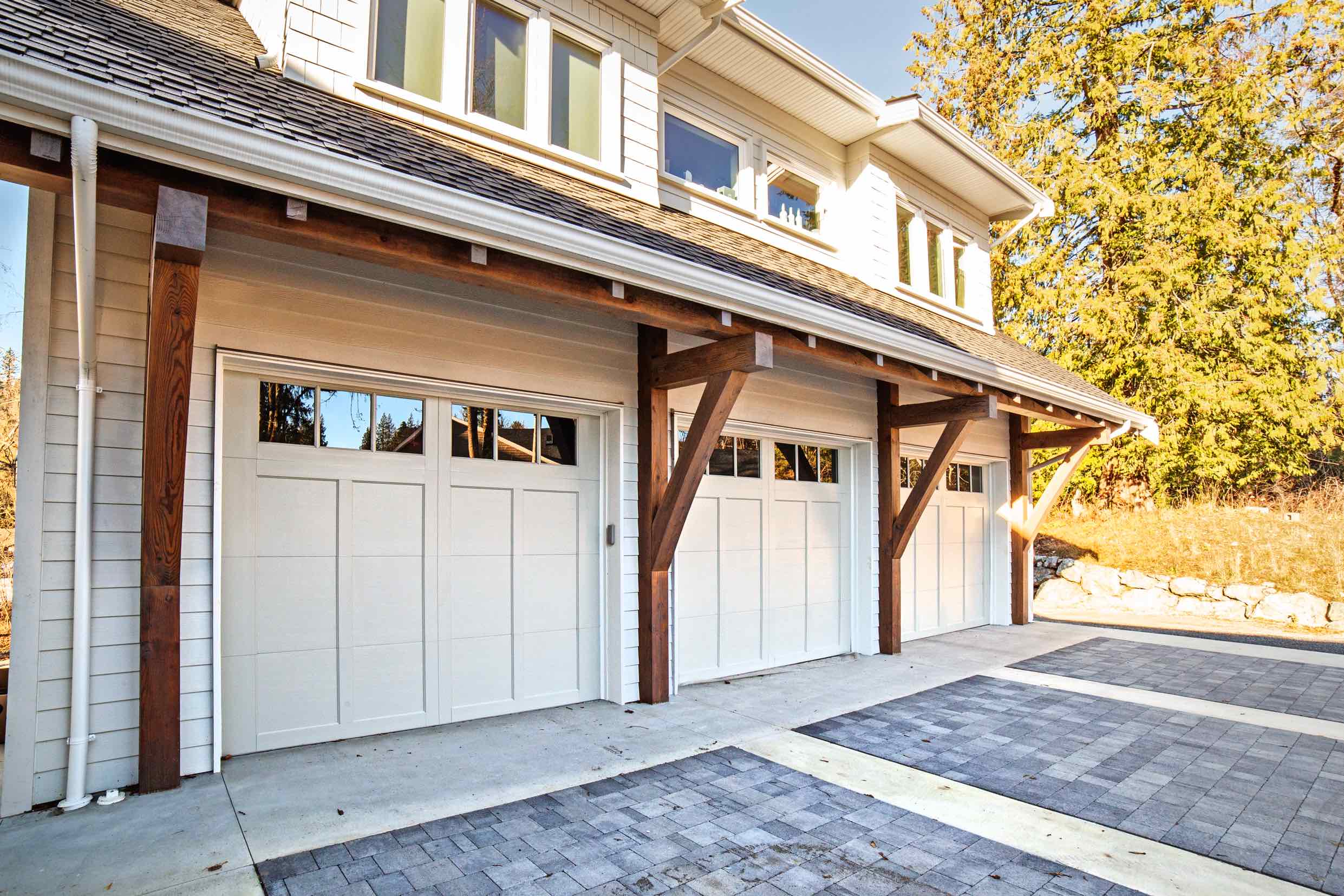 Exterior garage view of Timber Frame Home.