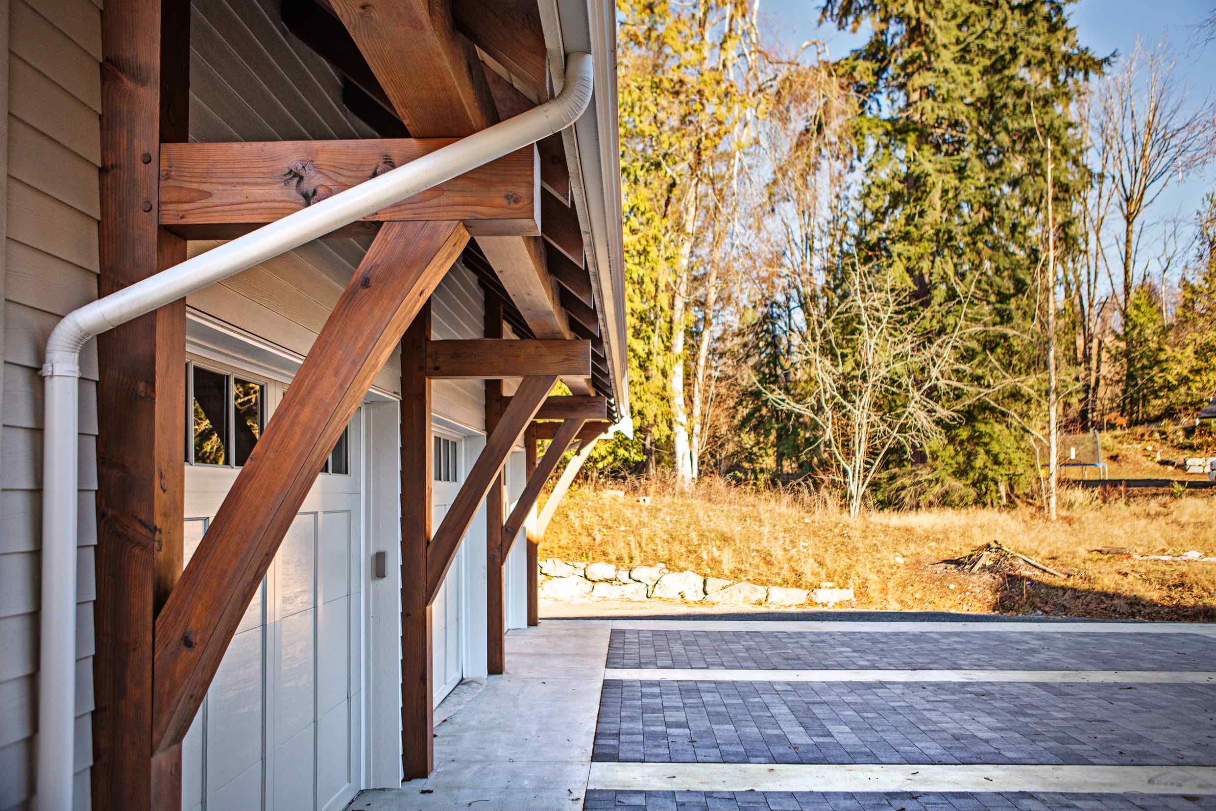 Exterior garage view of Timber Frame Home.