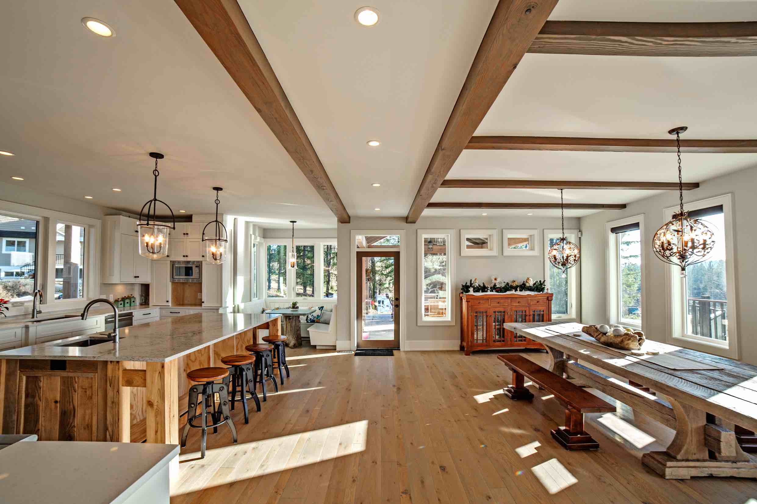 Kitchen and dinning room area view of Timber Frame Home.