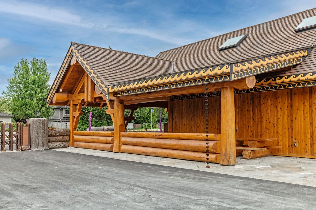 Custom built lavender land post and beam log home.