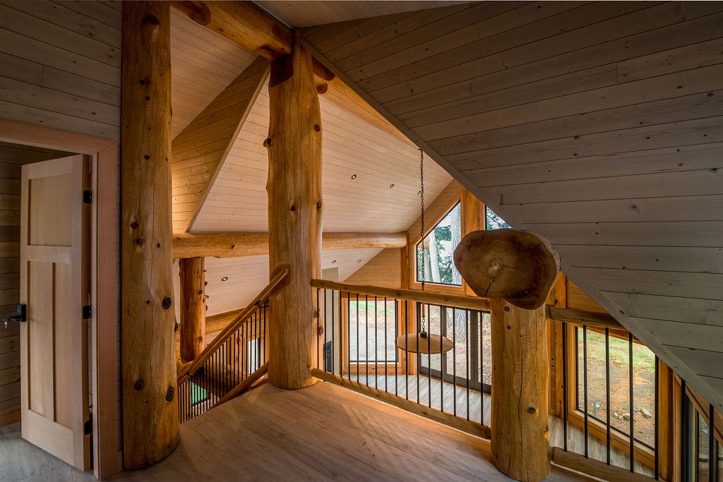 stair way and landing of connect log cabin kits custom built.